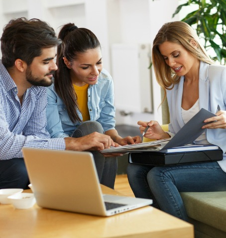 people discussing over the loan process with approved cash's loan referral service.